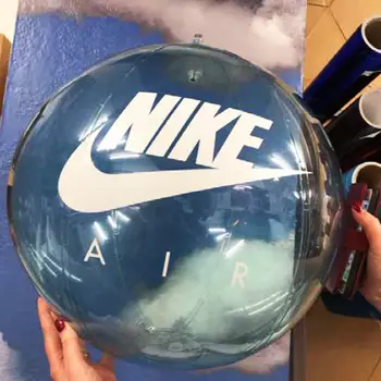 Nike Air Vinyl Decal applied to a large beach blue ball